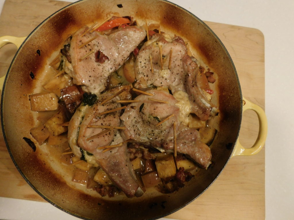 slow cooked pork chops, sweet potata and apples in a dutch oven