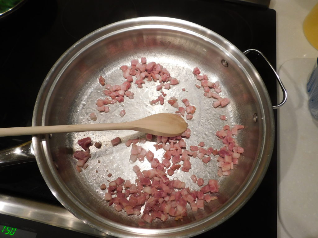 pancetta sauteed in a pan