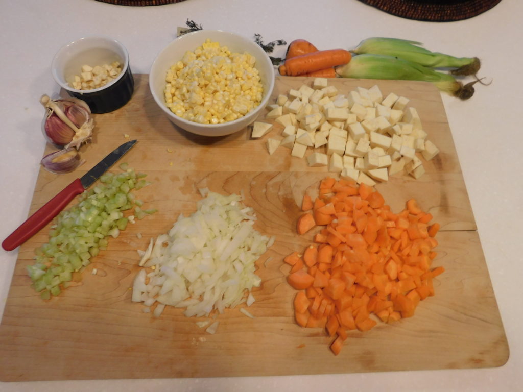 cutting board with fresh chopped ingredients